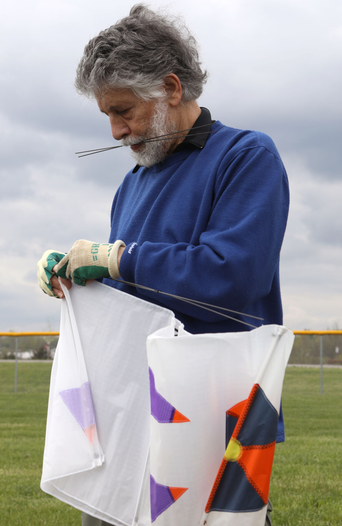 Mitch Cordover assembles a kite